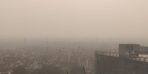 Delhi skyline hidden behind a thick grey layer of smog