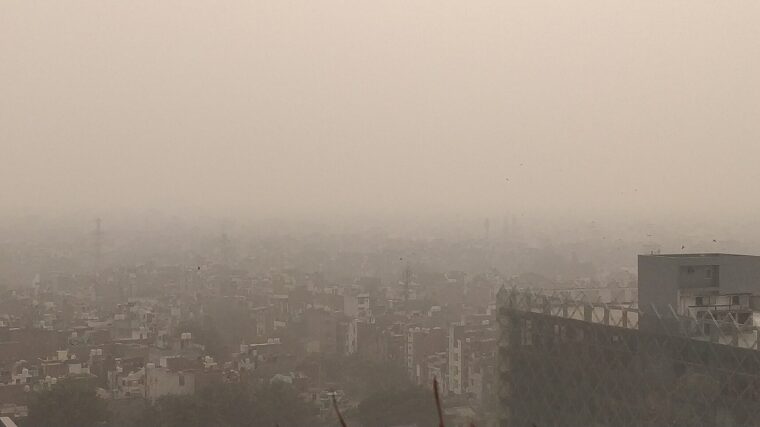 Delhi skyline hidden behind a thick grey layer of smog