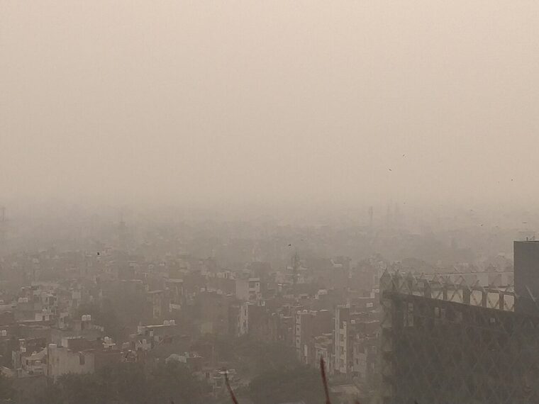 Delhi skyline hidden behind a thick grey layer of smog